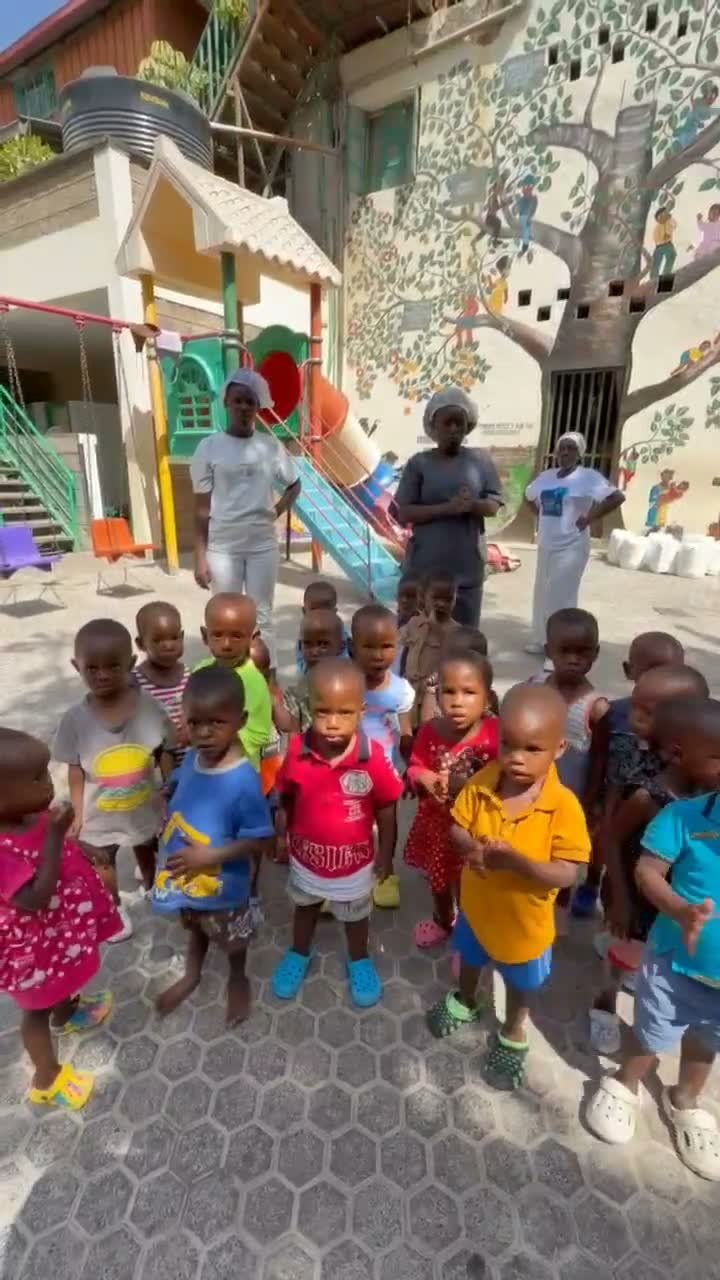 Volunteer with a child at a children's home